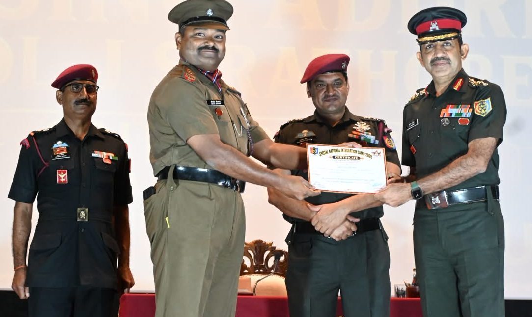 Lt. (Dr.) Benil Biswas receives the Best Associate NCC Officer Award at the Special National Integration Camp, Jaisalmer, 2026