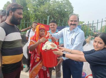 NSS volunteers, NCC cadets distributing relief material for the flood-affected people in Delhi during July 2023